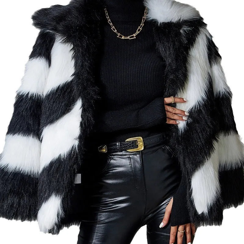 Women's faux fur coat with contrasting lapels and a full fur collar in a regular fit.