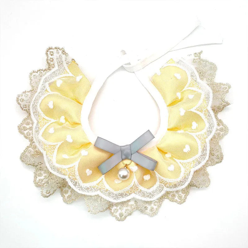 Yellow cotton polyester cat bib with lace trim, princess style, sizes XS S M L, lace and side lacing measurements shown.