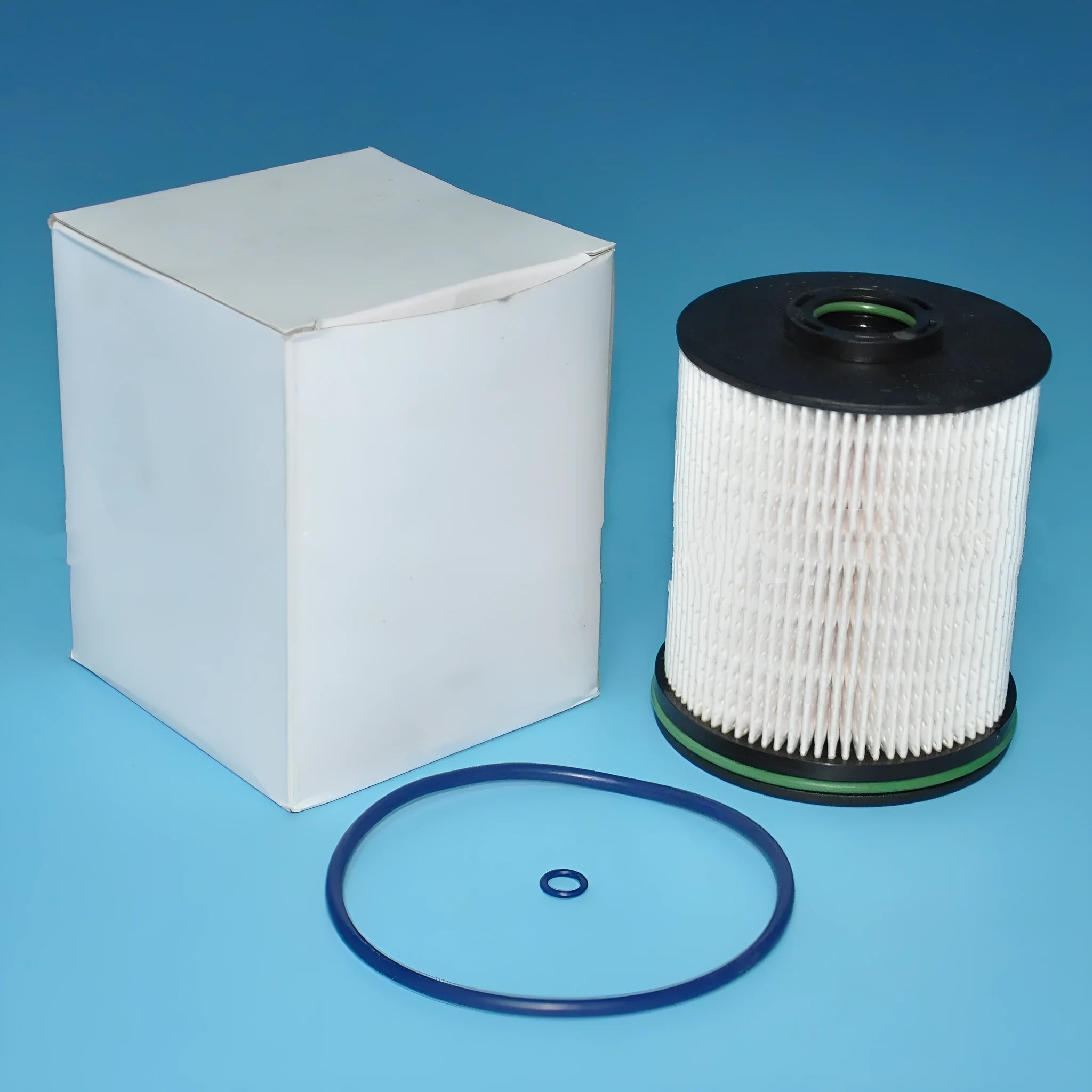 Vauxhall Opel Astra diesel fuel filter element with gasket, showing part numbers and dimensions.