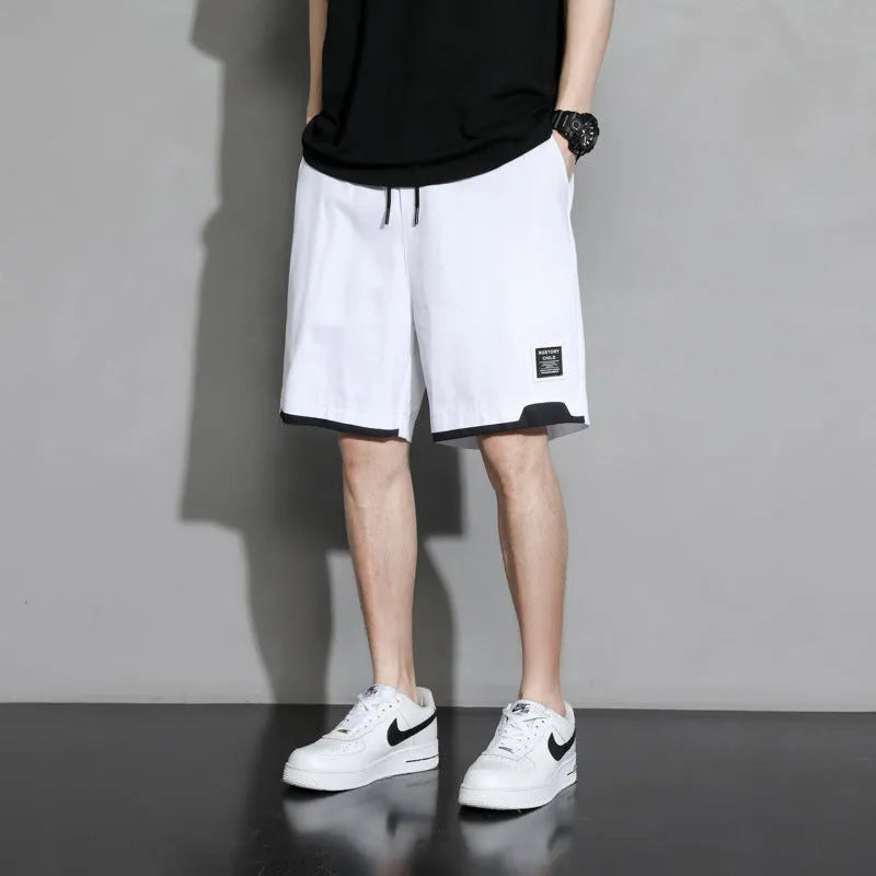 Casual cotton shorts for teenage boys in black, khaki, or white, shown in a plus size range.