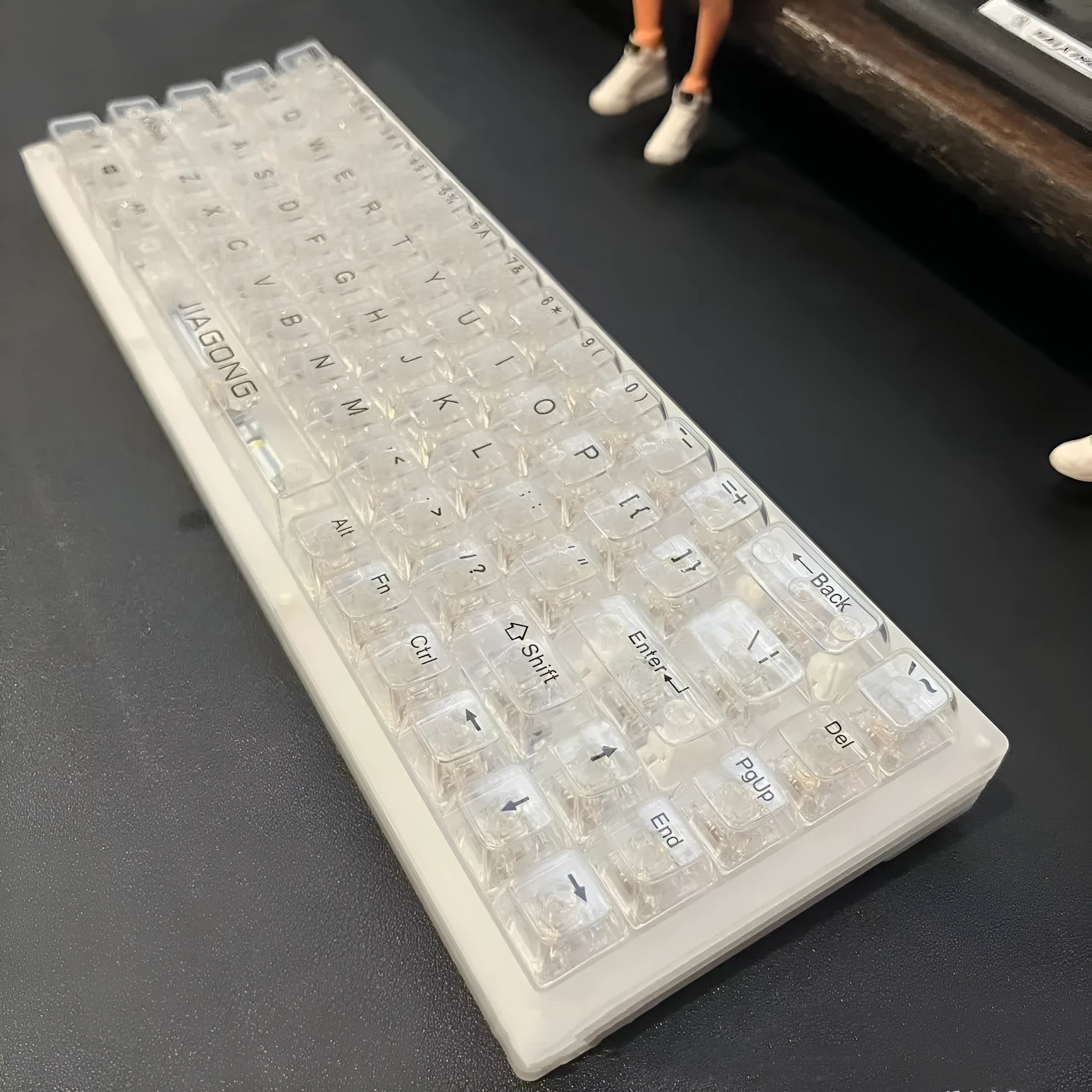 Universal transparent plastic 132-key mechanical keyboard cap set showing clear construction