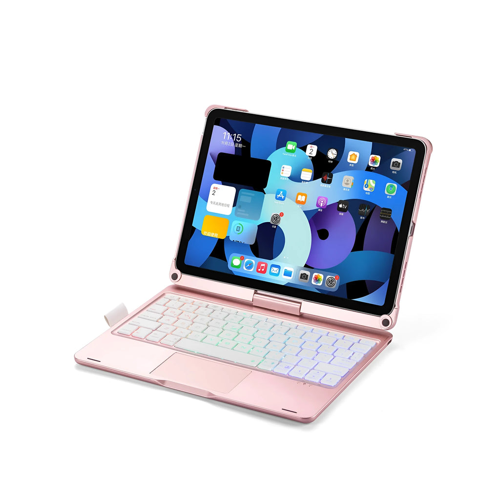 Rotating Bluetooth keyboard with backlit keys next to an iPad tablet