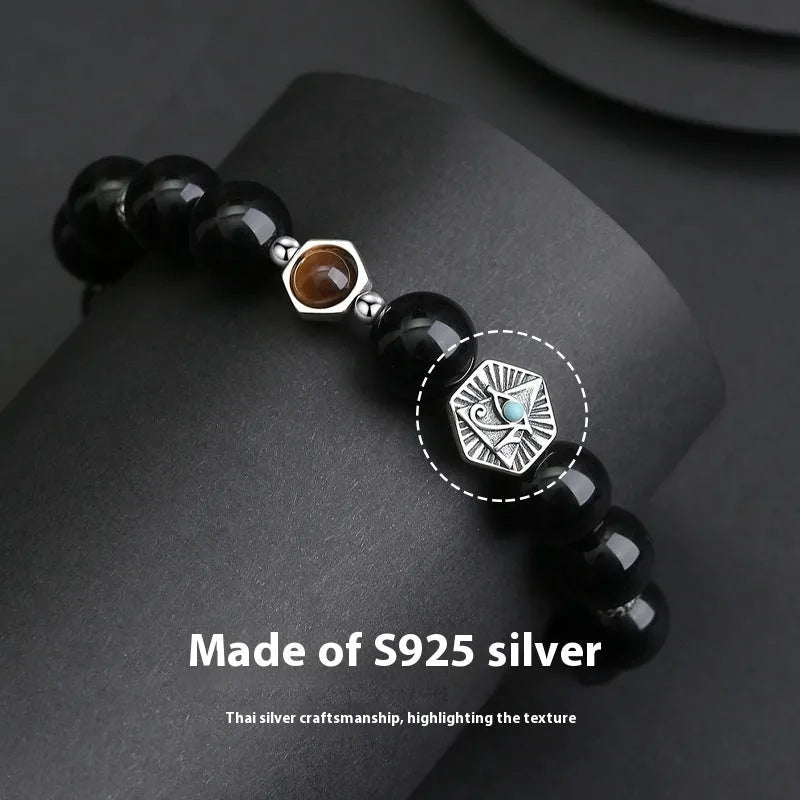 Men's geometric God's Eye obsidian bracelet in S925 sterling silver on wrist