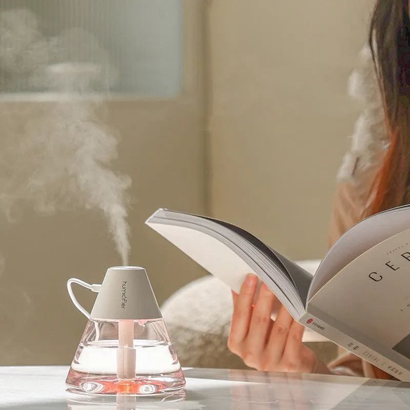 White plastic desktop USB humidifier with atmosphere lamp, single fog outlet, compact design for small rooms
