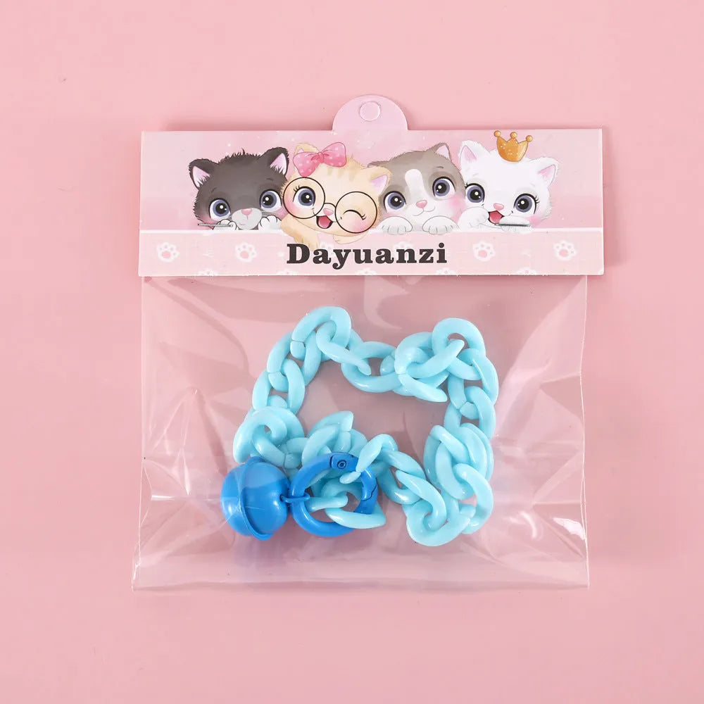 Macaron candy colour plastic pet collar on white background showing chain blue, pink and mixed colour options