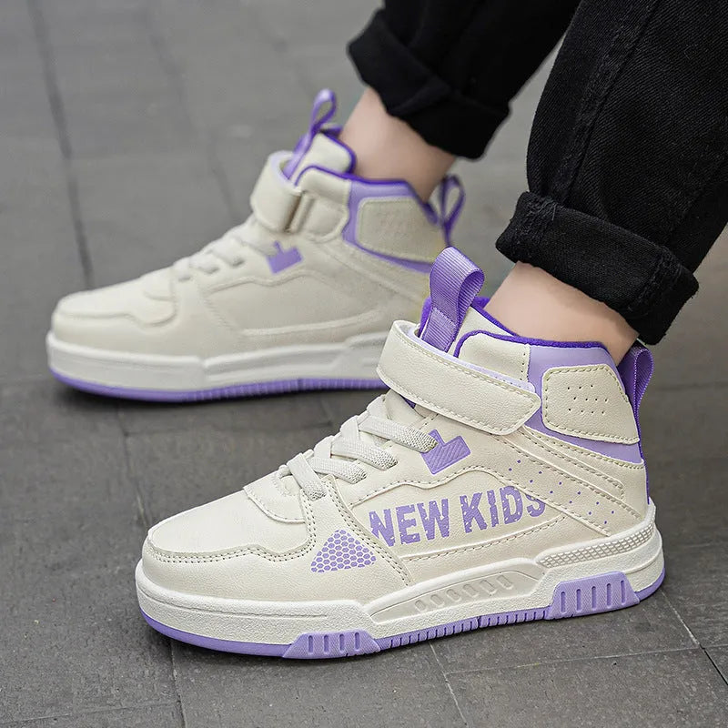 Children's buckle-fastened street sneakers in neutral colours with PU upper and rubber sole.