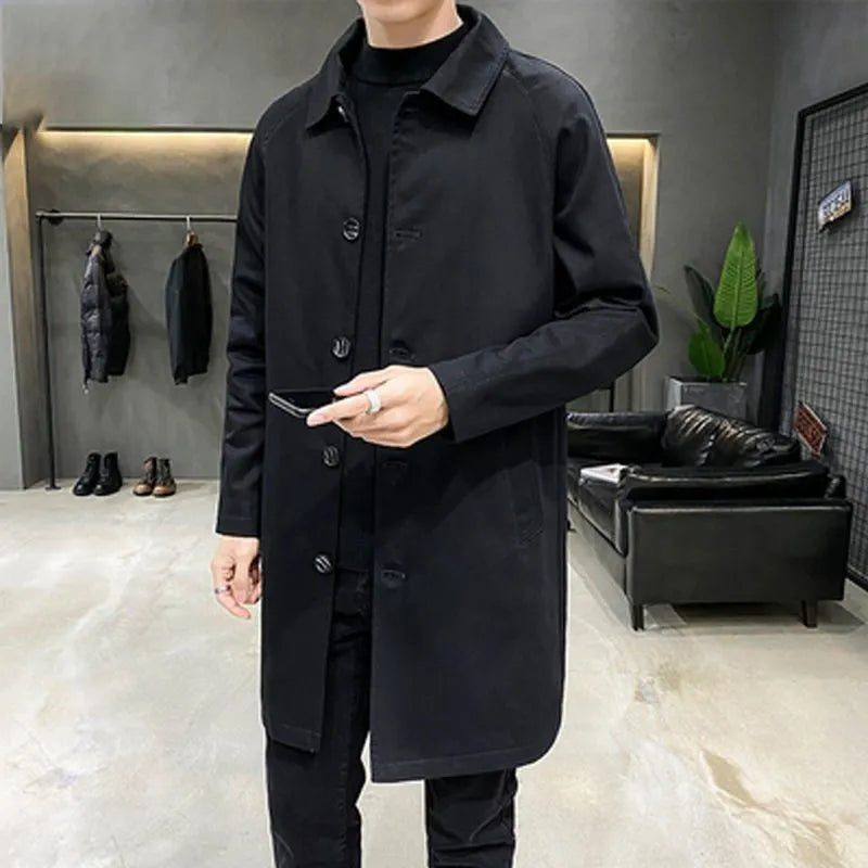 Men's loose fit mid-length trench coat in rabbit fur, shown in khaki colour.