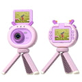 Purple and dark green children's digital camera with flip screen, silicone case, and carry lanyard.