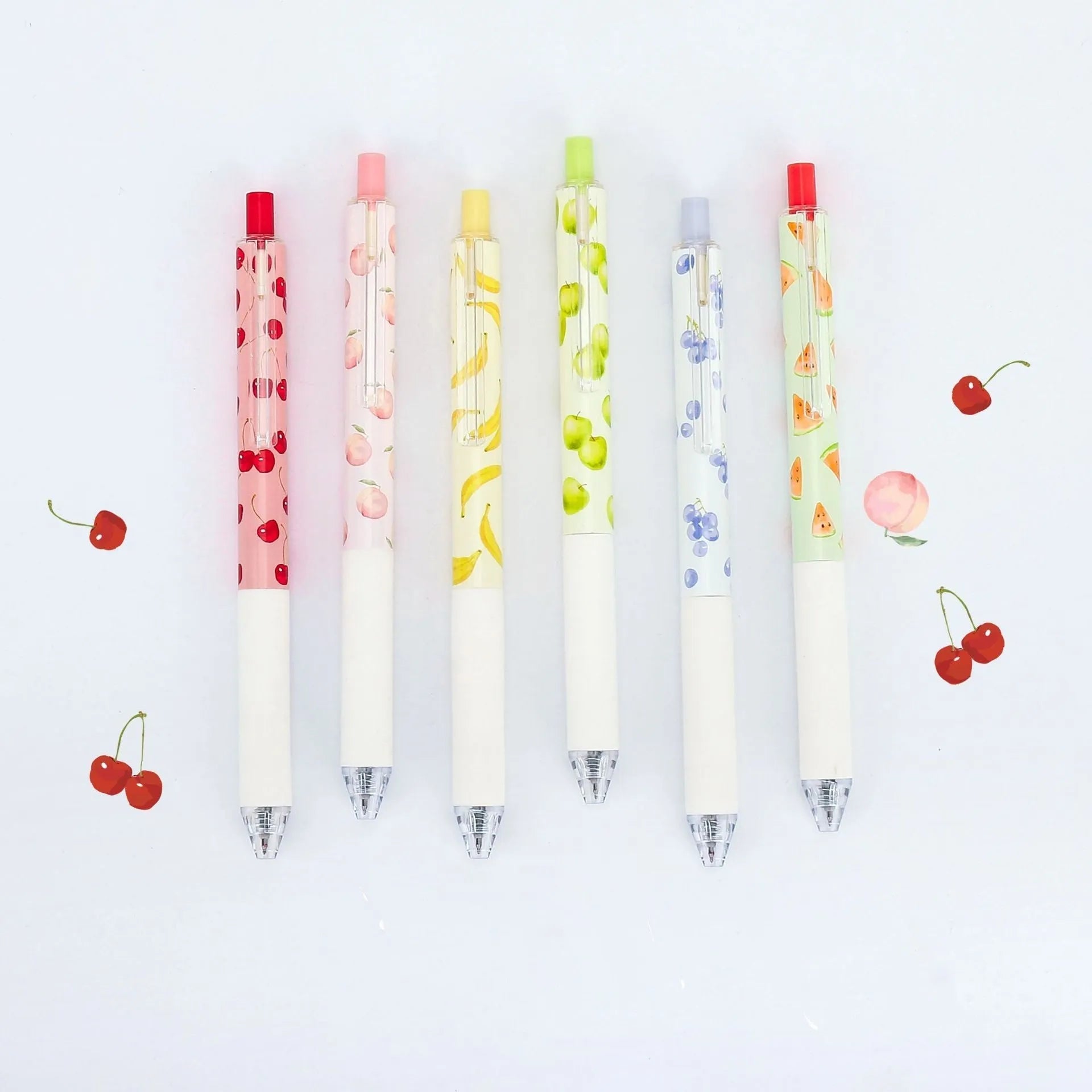Three fruit-scented pressurised pens with 0.5mm black refills and plastic barrels