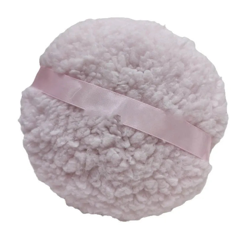 Oversized rectangular plush powder puff for makeup application measuring 150x75mm
