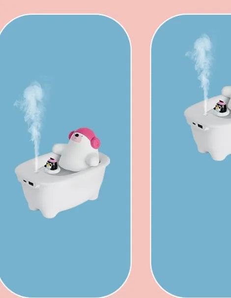 White Creative USB desktop air humidifier and scent diffuser on a wooden table.