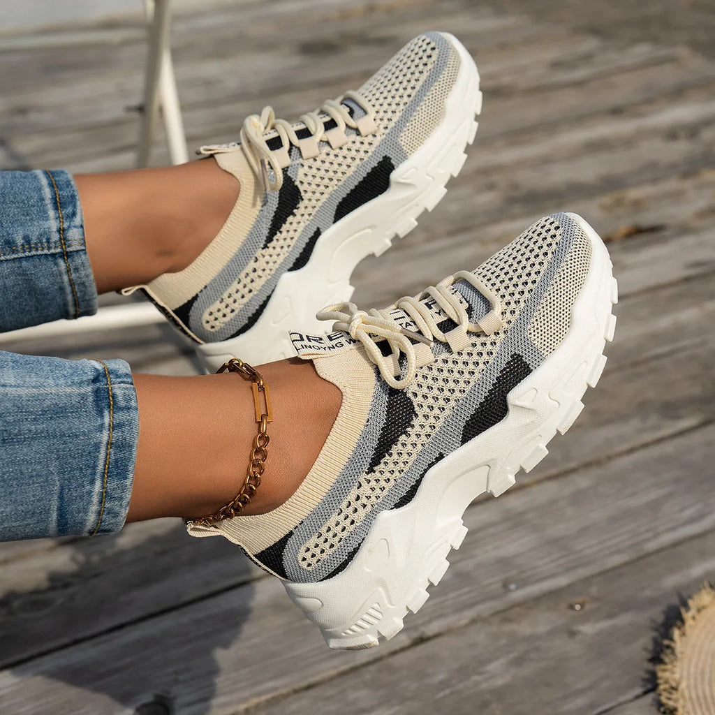 Women's Flyknit mesh lace-up sneakers in grey colour with low rubber sole