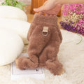 Khaki four-legged dog coat with high collar and plush fleece, shown with a towing ring on the back.