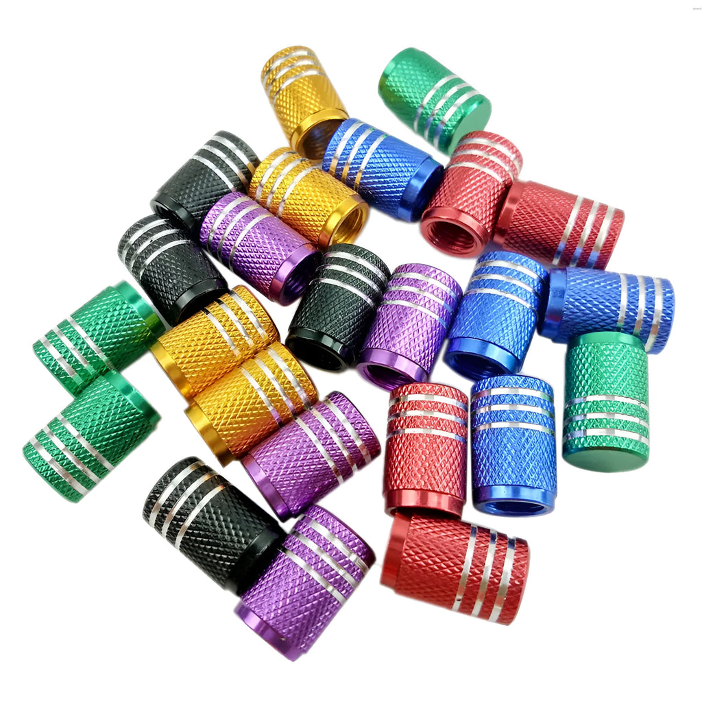 Coloured aluminium valve caps for car tyres, shown in yellow, red, purple, blue, green and black