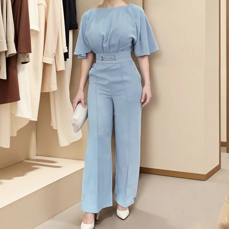 Blue men's two-piece polyester suit with long sleeves and trousers on a hanger