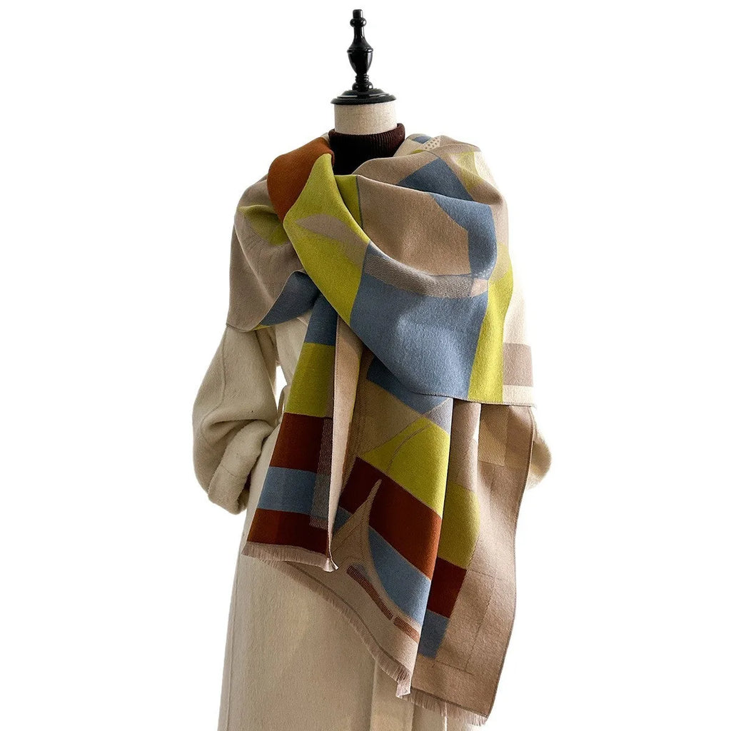 Long beige imitation cashmere style polyester scarf draped to show its 185 cm length and texture.