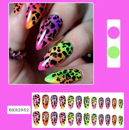 Wear Armour medium almond nail stickers showing four decorative designs including French leaves and gradient leopard print patterns