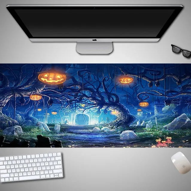 Oversized Halloween-themed gaming mouse pad on a desk, showing anti-slip base and graphic design.