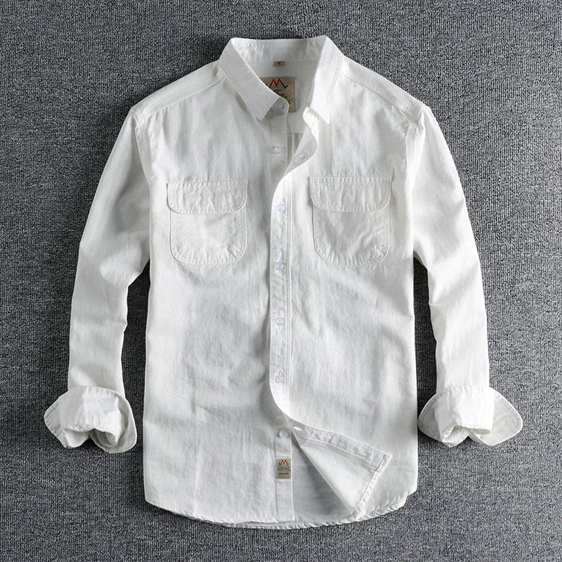 Men's light blue cotton long sleeve shirt in a retro cardigan style on a hanger