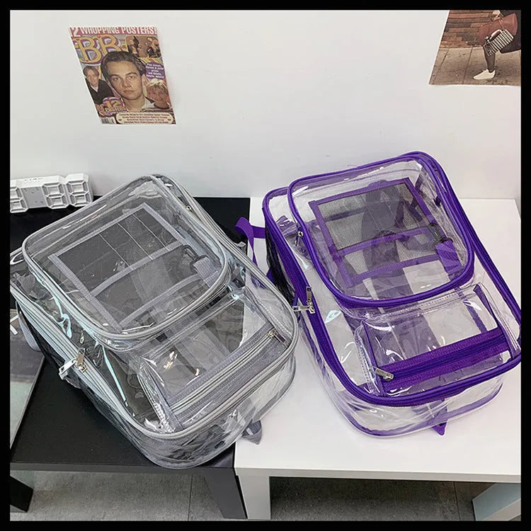 Transparent PVC waterproof backpack in grey with a visible black voile inner bag inside.