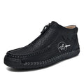 Men's black slip-on casual loafers with round toe and rubber sole on a white background.