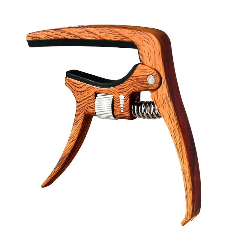Aroma Capo AC-30 guitar capo in silver or wood grain colour, zinc alloy and silicone, with tuning clip