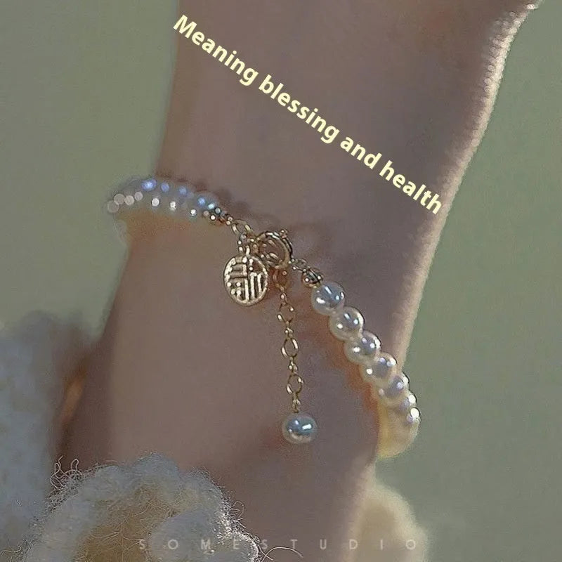 Chinese style glass bead bracelet with bamboo leaf design and manual craftsmanship details.