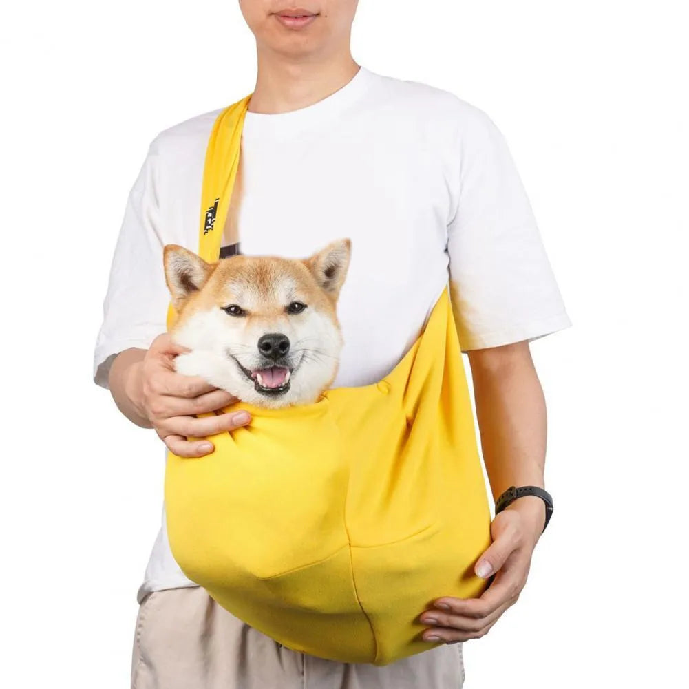 Large grey folding cat messenger backpack with mesh windows, shown on a person's back.