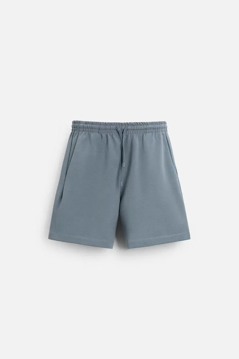 Loose double-sided texture polyester top and matching shorts casual set shown in blue.