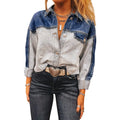 Blue women's loose fit denim coat with a single row of multiple buckles down the front.