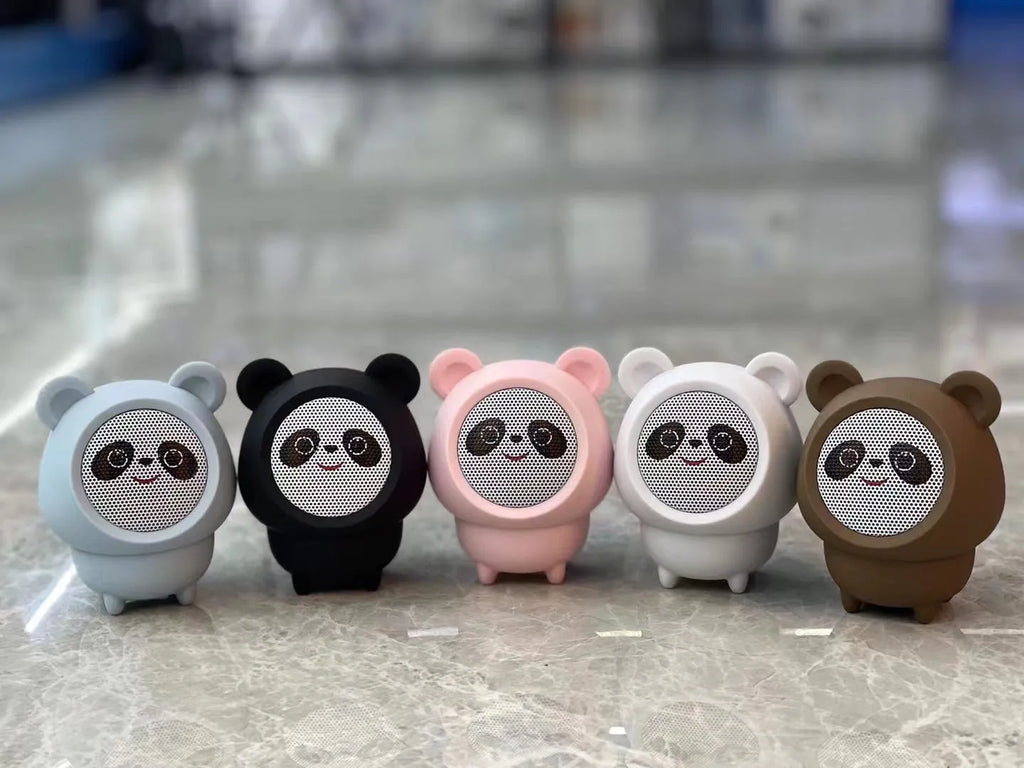 Cartoon panda desktop Bluetooth speaker in plastic, shown in one of five colours: white, pink, blue, black or brown.