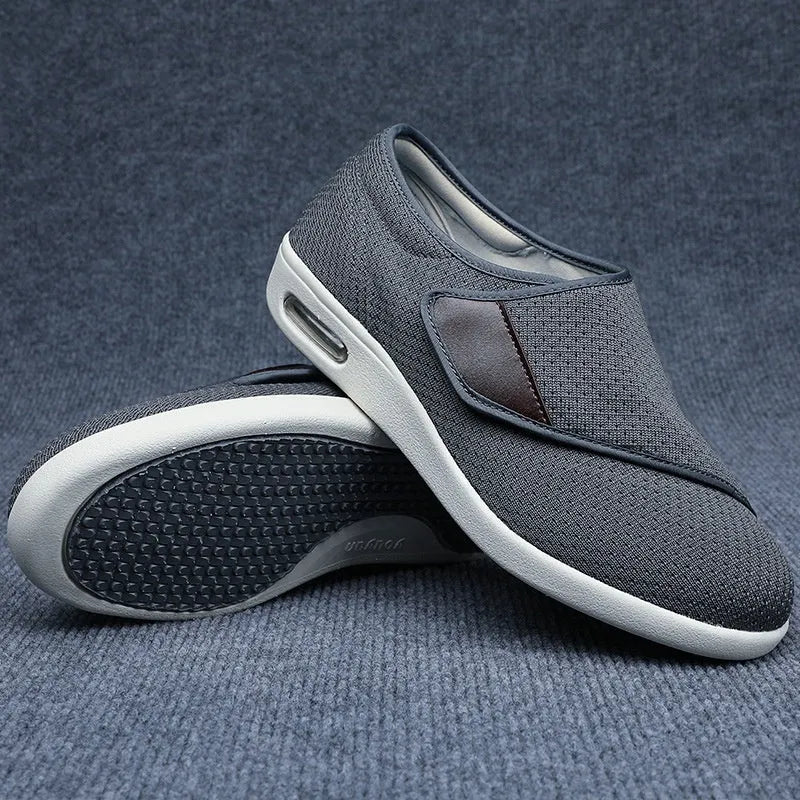 Beige leisure shoes with a Velcro strap closure and a round toe.