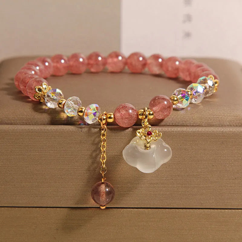 Women's natural bracelet with strawberry quartz, white agate beads, and auspicious cloud charms