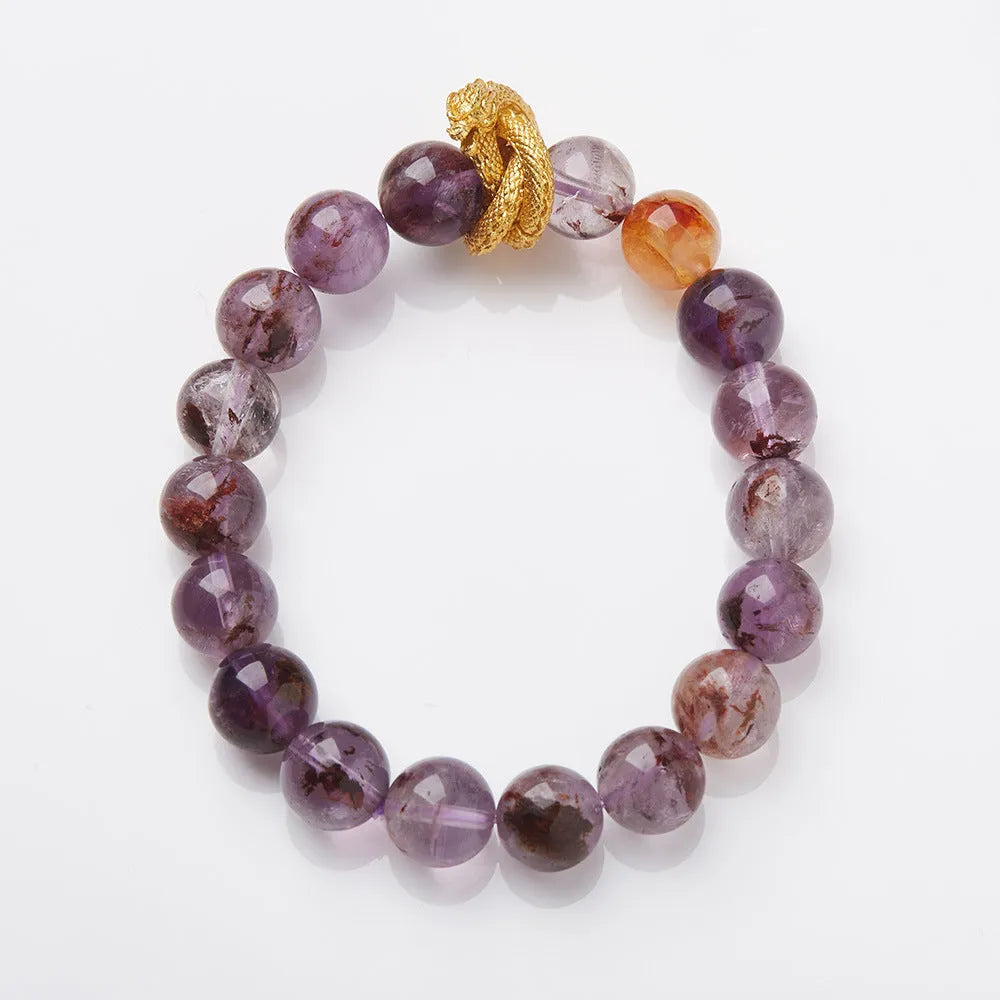 Purple ghost crystal bracelet with nine purple symbols and zodiac animal motifs measuring 10mm wide