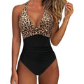 Women's printed one-piece swimsuit with backless design and sleeveless cut in polyester fabric
