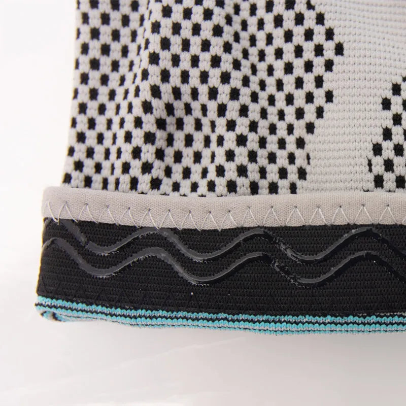 Sky blue silicone knee pad for running and basketball, made from elastic fibre.