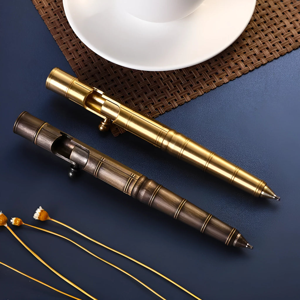 Brass bolt action tactical pen with cylindrical design and six-ring grip pattern