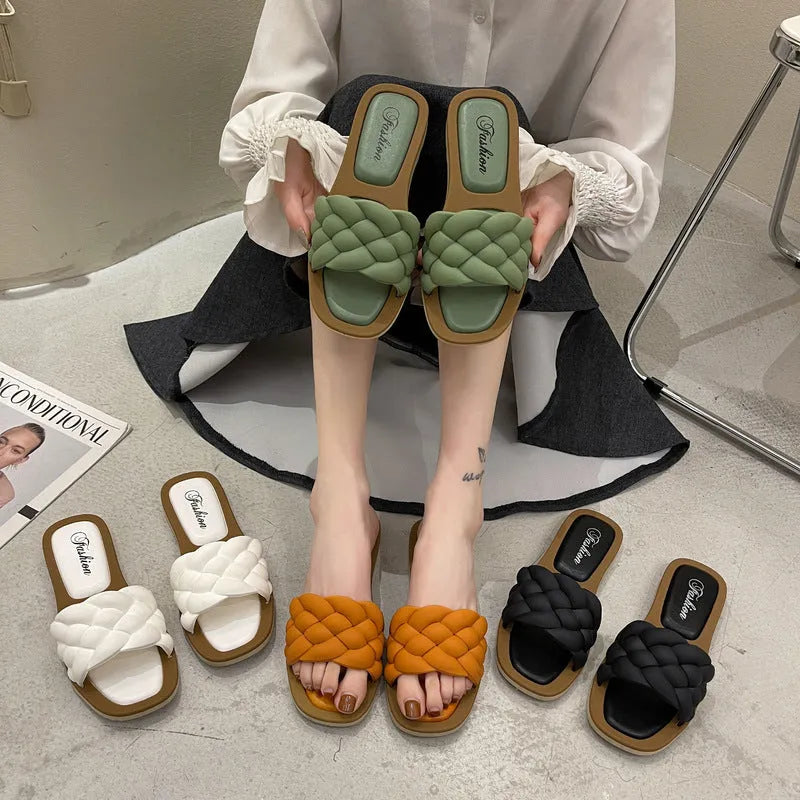 Women's PVC beach sandals with a thick non-slip sole in black, shown on a white background.