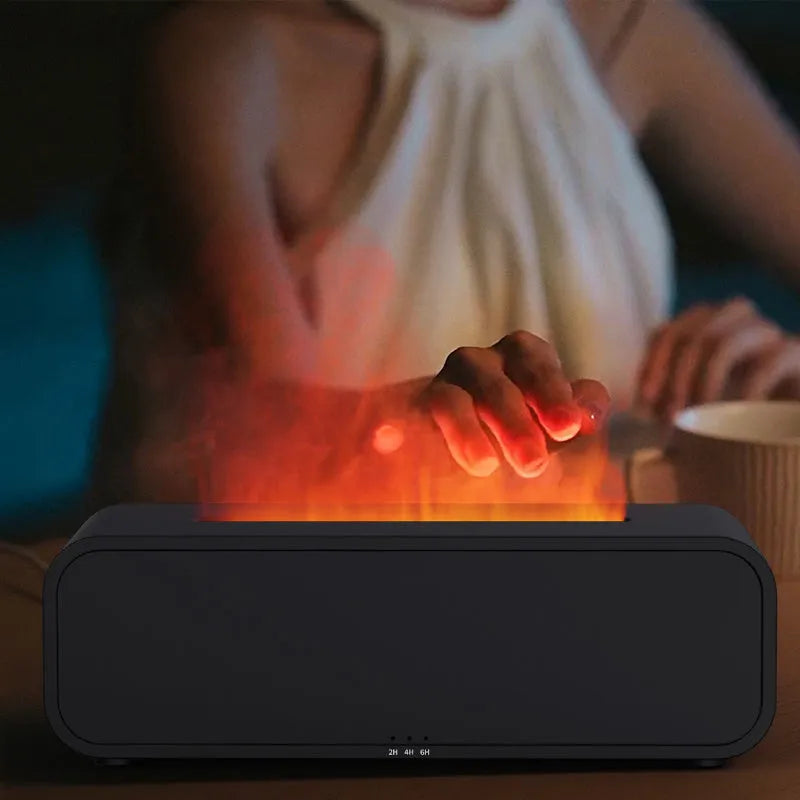 Black and white essential oil diffuser showing flame effect and colour-changing lights with remote control.