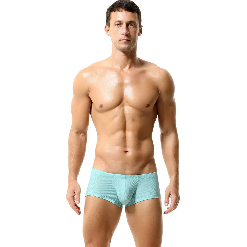 Men's low waist nylon boxers in solid colours including orange red and cloudy blue