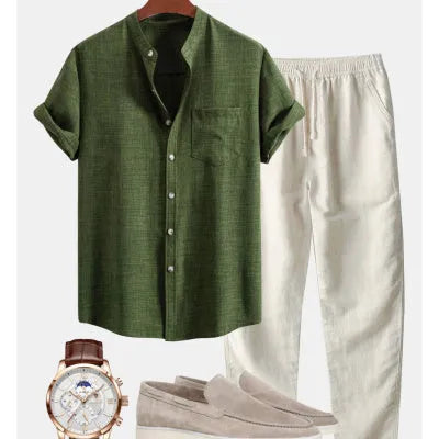 Men's blue slim-fit short-sleeved shirt with stand collar, part of a set with trousers, shoes, and watch