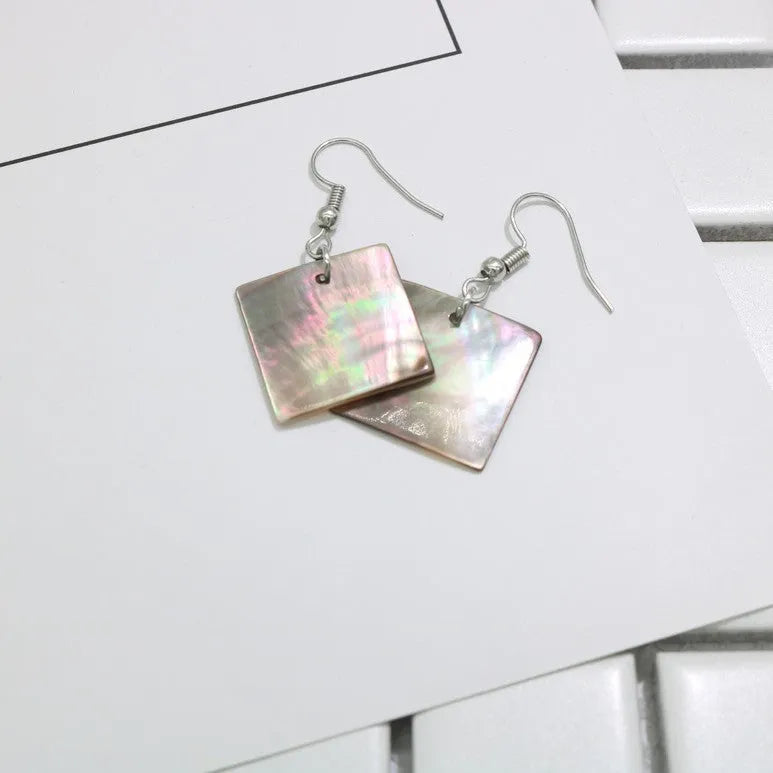 Women's geometric shell earrings in square panther or rectangular shell designs with natural material