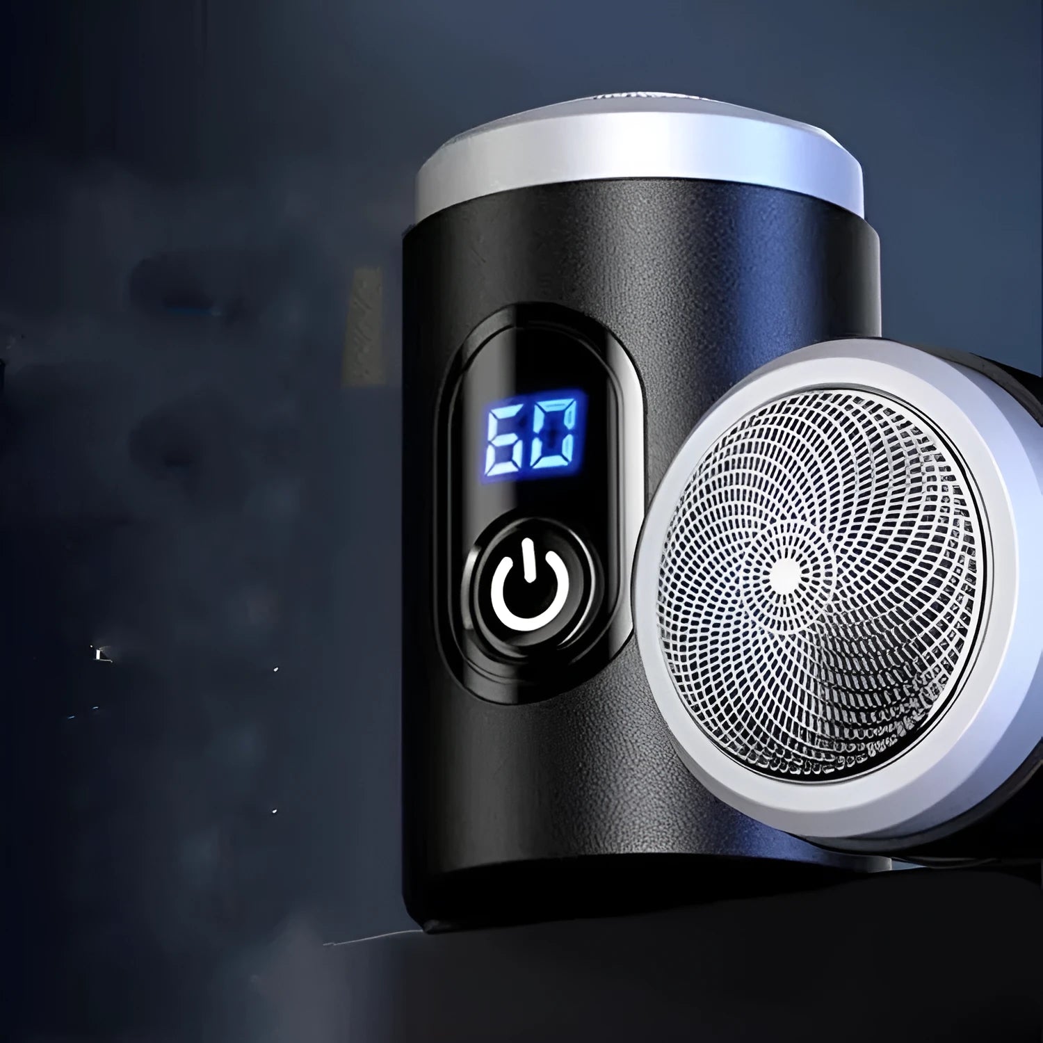 Black portable USB rechargeable shaver with LED display on a clean background.