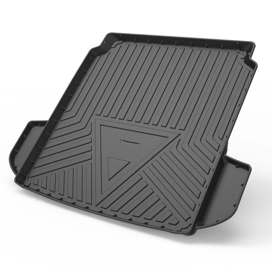 Black TPE car boot liner with carbon fibre texture pattern for specific vehicle models.