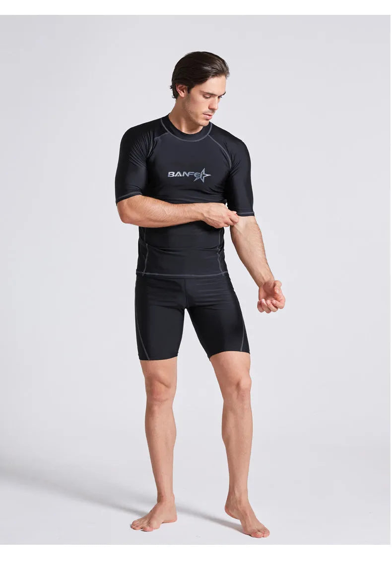 Men's blue quick-dry half sleeve swimsuit for surfing and snorkelling with nylon fabric