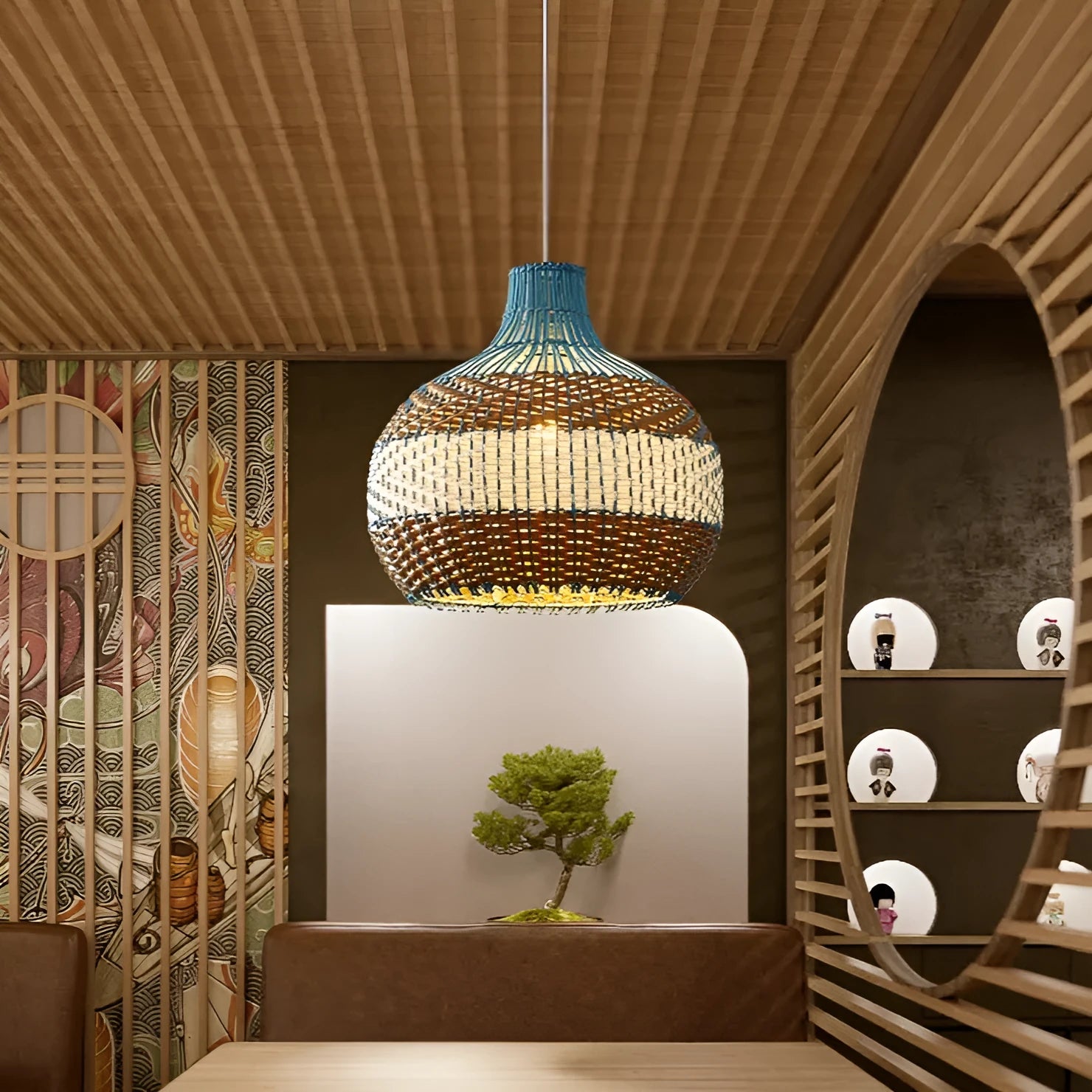 Woven vine pendant lamp in Southeast Asian pastoral style, showing natural texture and soft warm white glow.