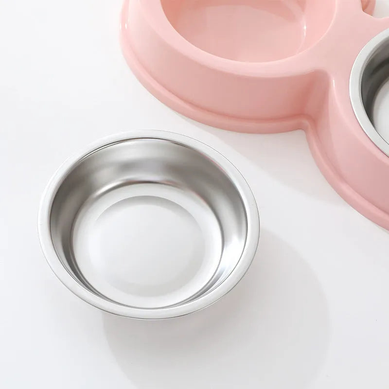 Stainless steel pet double feeding bowl with frog design in blue, green, and pink colours