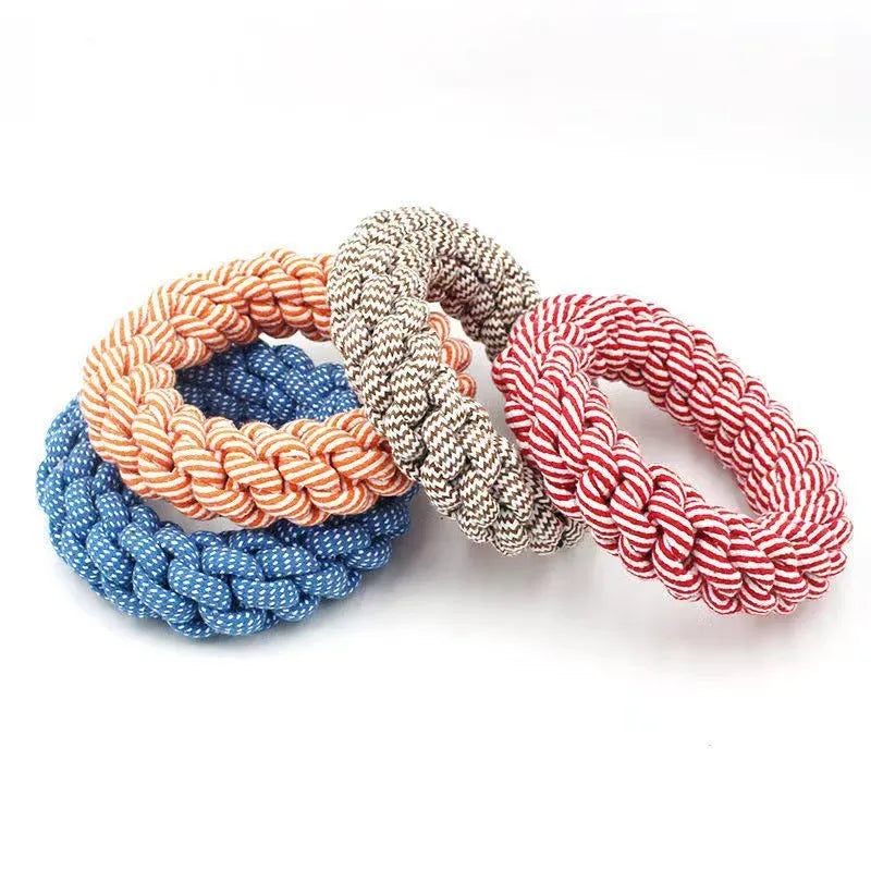 Close-up of a cotton braided ring knot toy for dogs, approximately 18cm diameter, made from cotton thread in a random colour