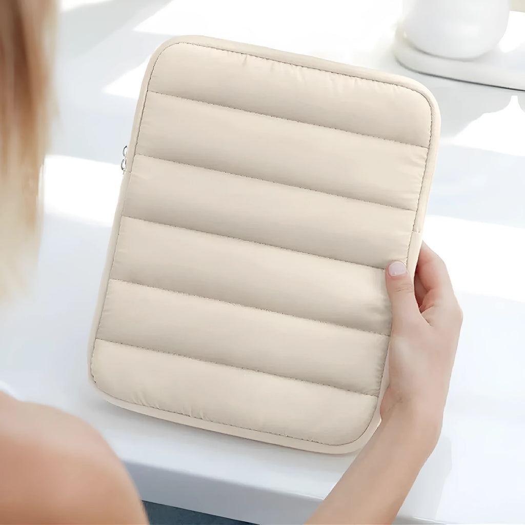Black fluffy puff laptop sleeve for 9.7-11 inch devices with elastic sides and waterproof lining