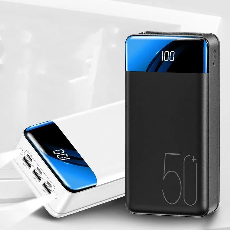 Large 50000mAh power bank in black or white with three charging ports and polymer lithium-ion cells